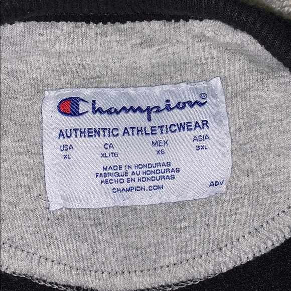 A black champion sweater. - Picture 3 of 4